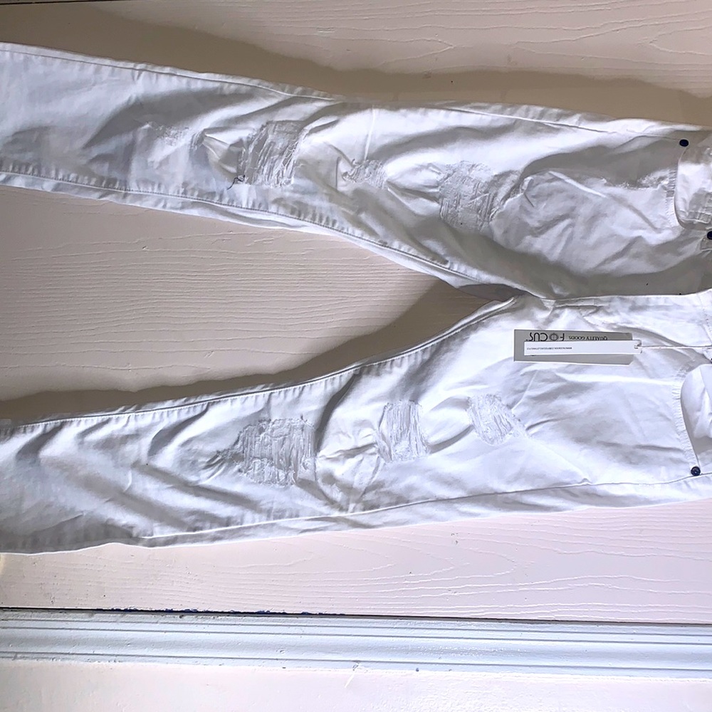 White ripped jeans